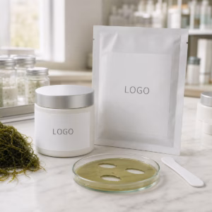 Private label collagen-positioned hand mask sachet sample with custom logo packaging area on a GUOCUI sample table