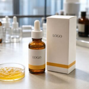 Private label turmeric radiance ampoule serum bottle and carton on factory sample table